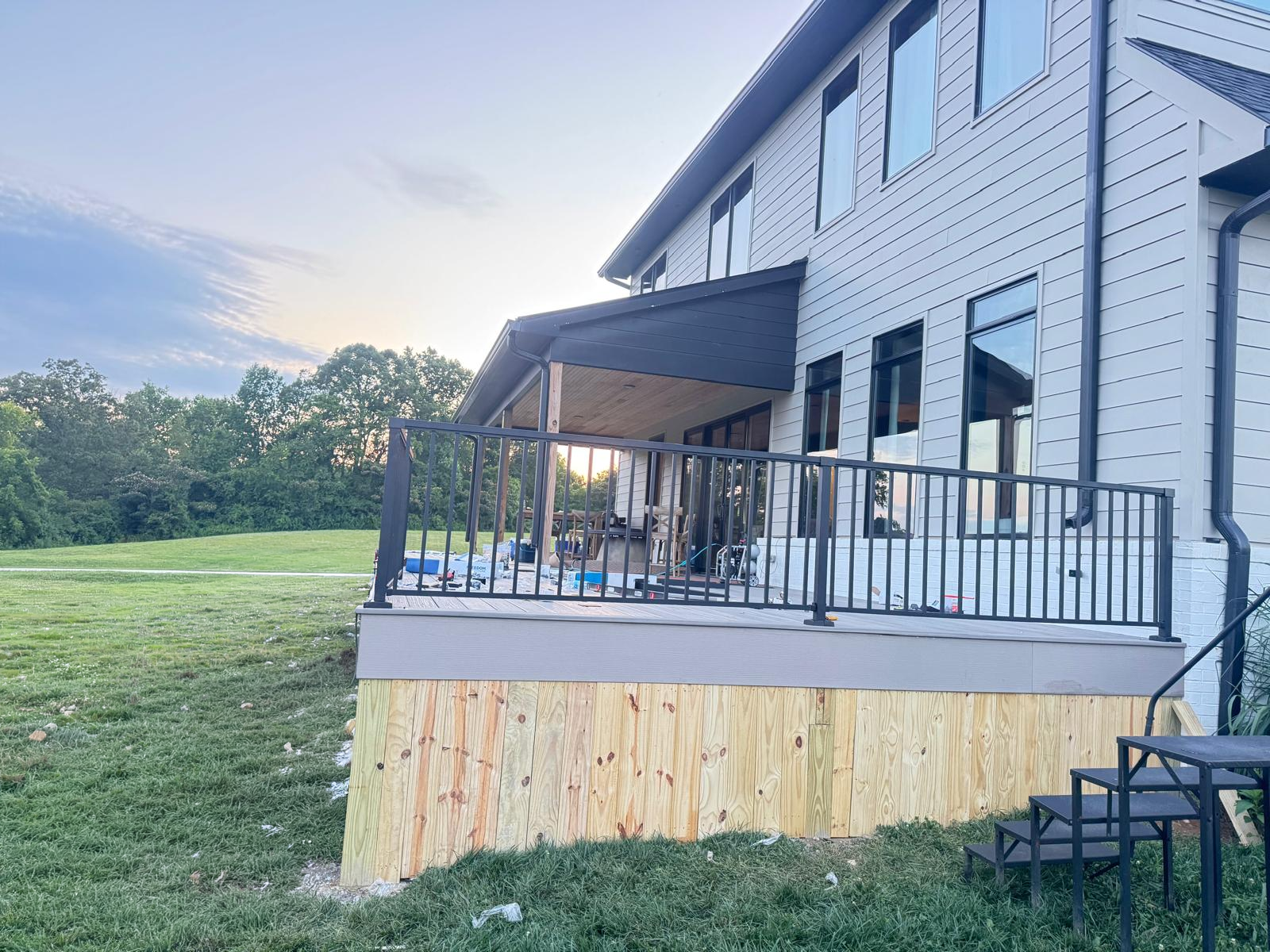 Residential property with mature trees and outdoor work in progress