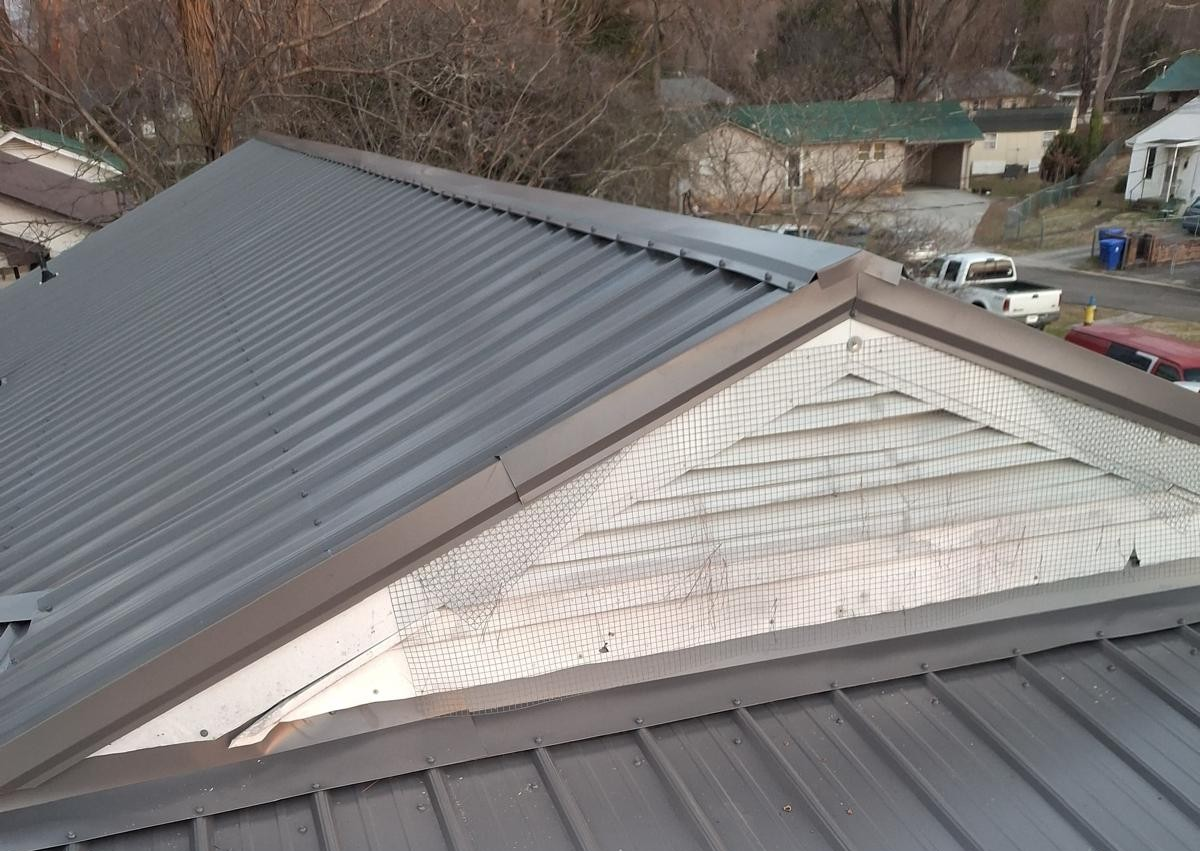 Completed roofing improvement coordinated with surrounding exterior property features